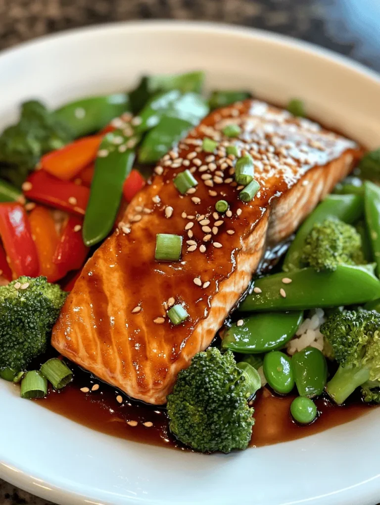 If you’re looking for a nutritious and delicious weeknight dinner, look no further than this Baked Teriyaki Salmon with Veggies. This dish is a vibrant symphony of flavors, featuring succulent salmon fillets glazed with a glossy teriyaki sauce, served alongside colorful veggies like broccoli, red bell peppers, and snow peas. The best part? It can be prepared in under an hour, making it an ideal choice for busy schedules. Plus, the combination of sweet and savory flavors will tantalize your taste buds, ensuring a delightful dining experience for you and your loved ones.