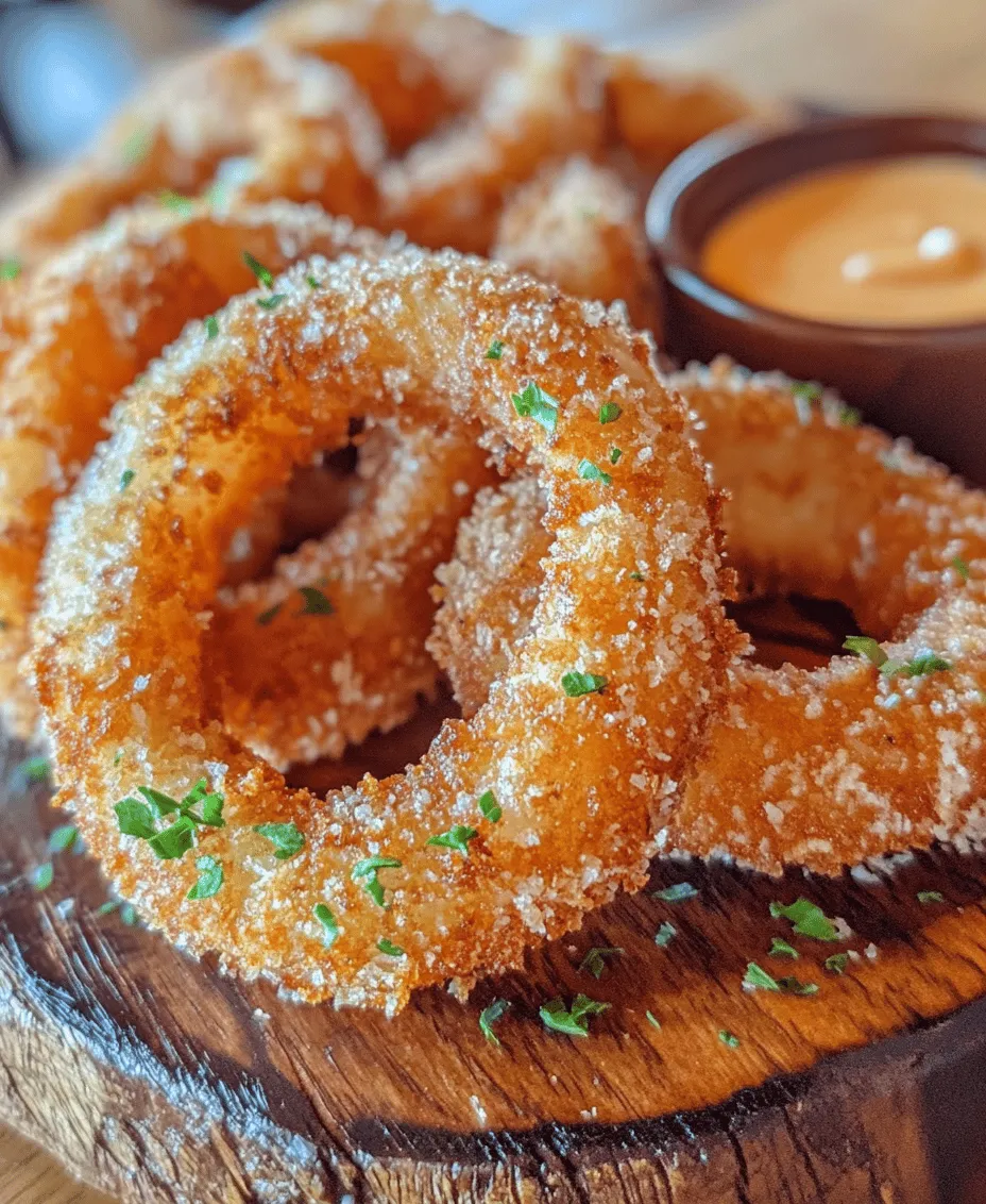 Onion rings are a classic snack and side dish that has captured the hearts and taste buds of food lovers around the world. Whether served alongside a juicy burger or as a standalone treat, these crispy delights offer a satisfying crunch that is hard to resist. The allure of crispy, homemade onion rings lies not just in their taste but also in the joy of preparing them from scratch. With every bite, you experience the perfect blend of sweetness from the onions and the satisfying crunch of a well-fried batter.