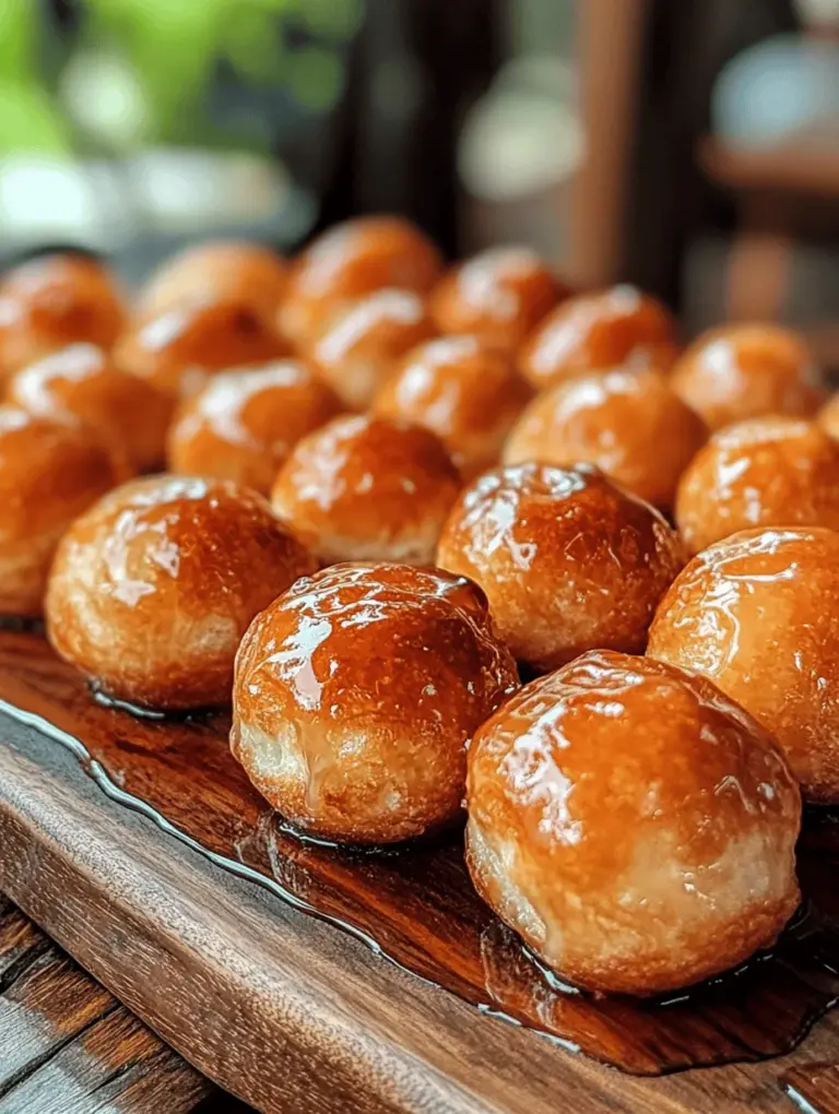 Donut holes have surged in popularity over recent years, becoming a favorite among dessert lovers for their delightful bite-sized nature and versatility. These little spheres of perfection are not only easy to eat but also provide a canvas for endless flavor combinations. One of the most beloved varieties is the Maple-Glazed Donut Hole, which combines a fluffy and tender texture with the rich, warm flavor of maple syrup.