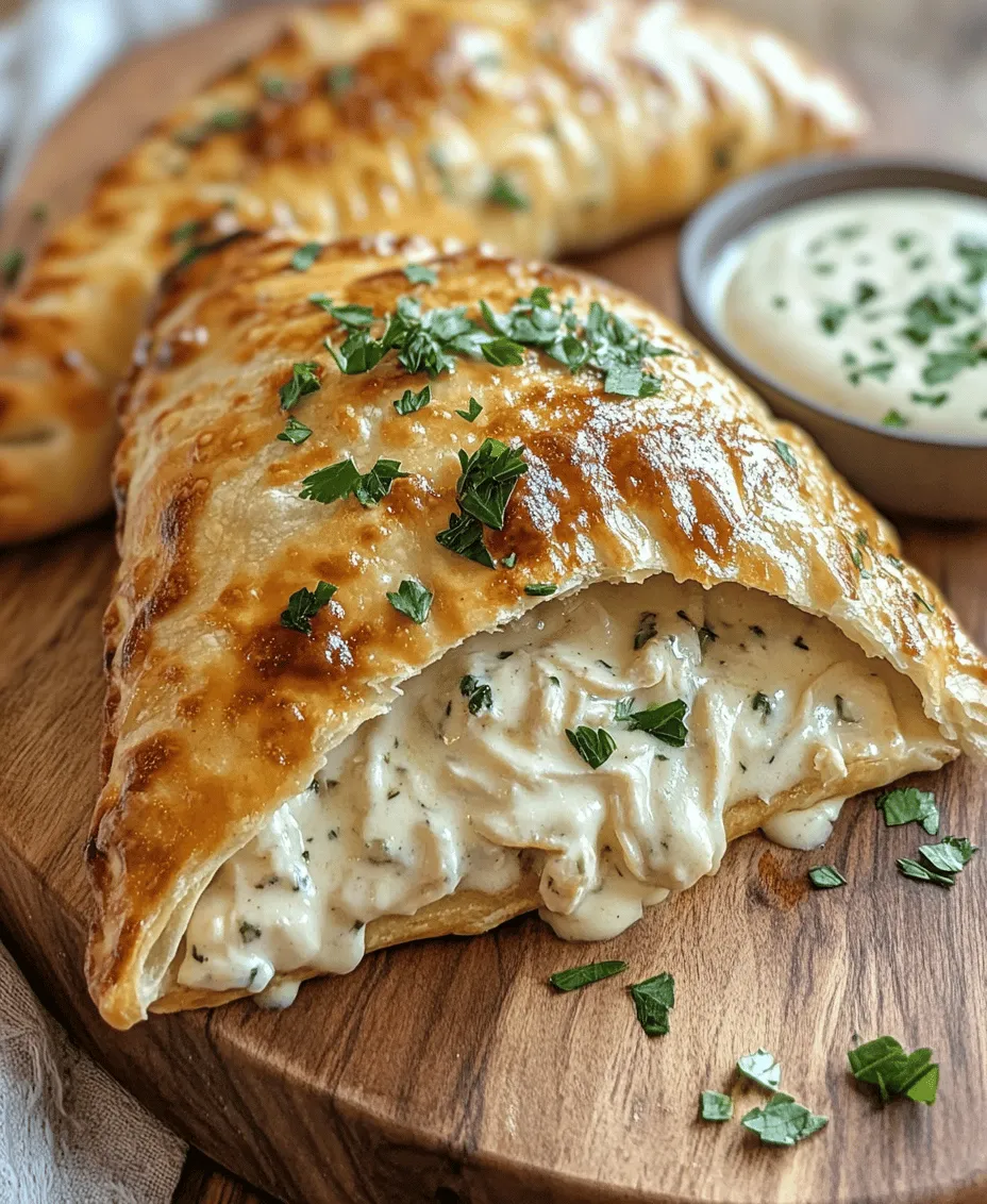 Calzones, often described as pizza's delightful cousins, have captured the hearts and appetites of food lovers around the world. Originating from Italy, these half-moon-shaped pockets of goodness are stuffed with a plethora of fillings, making them incredibly versatile and beloved by many. The Chicken Alfredo Air Fryer Calzones are a modern twist on this classic dish, combining the rich, creamy flavors of Alfredo sauce with tender chicken, all encased in a perfectly crisp exterior that the air fryer helps achieve. This recipe not only brings together a mouthwatering combination of flavors but also offers a healthier way to enjoy this Italian favorite without the excess oil used in traditional frying methods.