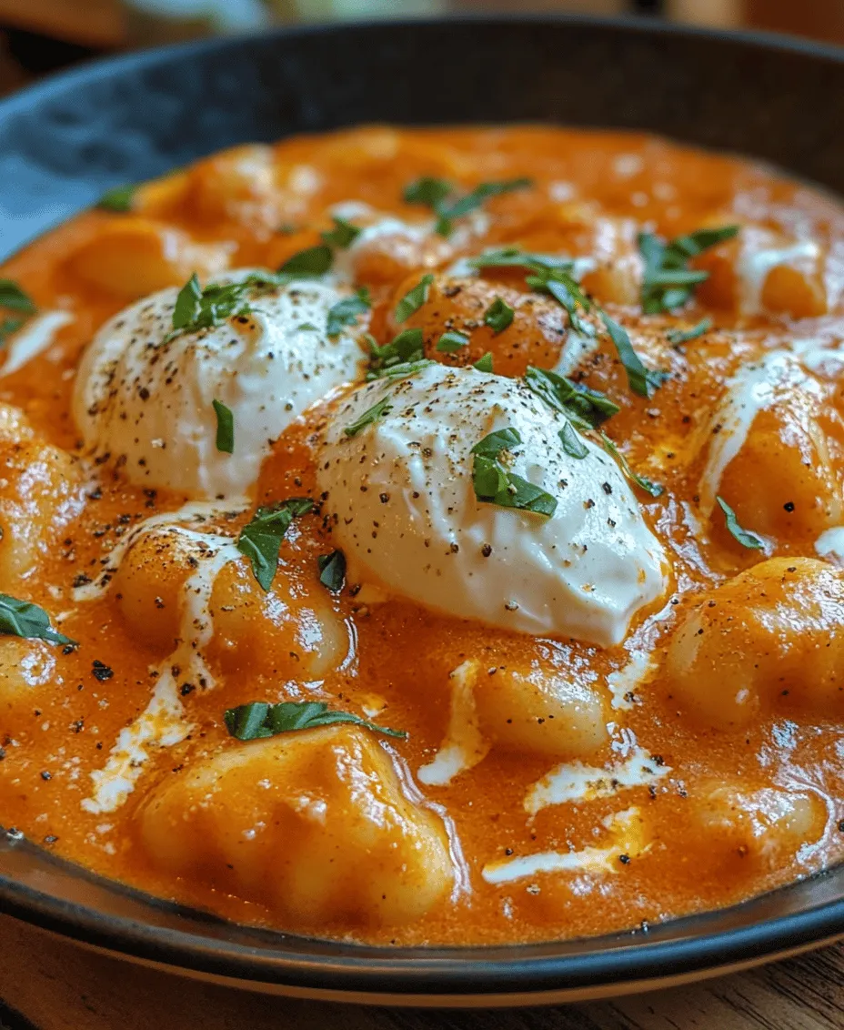 In the fast-paced world we live in, finding time to prepare a delicious, comforting meal can often feel like a challenge. Enter the <strong></noscript>30-Minute Creamy Tomato Gnocchi with Burrata</strong>—a dish that perfectly balances speed and flavor, making it the ideal choice for busy weeknights or even special occasions. This recipe combines the rich, velvety texture of a creamy tomato sauce with the delightful bite of soft gnocchi, all crowned with the luxurious touch of burrata cheese. The result is a meal that is not only satisfying but also visually appealing, inviting you to dig in and savor each bite.” /></p>
</p>
<h3>Step-by-Step Cooking Instructions</h3>
</p>
<h4>Preparing the Gnocchi</h4>
<p>To achieve perfectly cooked gnocchi, start by bringing a large pot of salted water to a rolling boil. Salt is crucial as it enhances the flavor of the gnocchi. Once boiling, add the gnocchi carefully to avoid splashing. Fresh gnocchi typically cooks in about 2-3 minutes, whereas dried gnocchi may take a bit longer. You’ll know they are done when they float to the surface of the water. This is a sign that they are cooked through, but be sure to taste one to ensure it has reached the desired texture—soft yet slightly firm to the bite. Once cooked, use a slotted spoon to remove the gnocchi from the pot and transfer them to a bowl. Drizzle a little olive oil over them to prevent sticking while you prepare the sauce.</p>
</p>
<h4>Sautéing the Aromatics</h4>
<p>In a large skillet, heat a couple of tablespoons of olive oil over medium heat. Add minced garlic and sauté for about 1-2 minutes. It’s crucial to monitor the garlic closely during this stage, as it can burn quickly, turning bitter and ruining the sauce. You want the garlic to be fragrant and lightly golden. If you prefer a milder garlic flavor, consider adding it at a lower heat and cooking it for a longer period, allowing it to infuse the oil without browning.</p>
</p>
<h4>Creating the Sauce</h4>
<p>To the sautéed garlic, add crushed tomatoes, a pinch of red pepper flakes for warmth, and a generous seasoning of salt and black pepper. Stir well to combine and bring the mixture to a simmer. Allow the sauce to simmer for about 10 minutes, uncovered, stirring occasionally. This simmering time is essential as it helps to deepen and marry the flavors. After 10 minutes, add in heavy cream, which will transform your sauce into a creamy delight. Stir and let it simmer for an additional 5 minutes, allowing the cream to fully integrate. If the sauce appears too thick, you can add a splash of the reserved pasta cooking water to achieve the desired consistency.</p>
</p>
<h4>Combining Gnocchi and Sauce</h4>
<p>Once your sauce is ready, it’s time to bring everything together. Add the cooked gnocchi directly into the skillet with the sauce. Gently toss the gnocchi in the sauce, ensuring each piece is evenly coated. If you find that the sauce is too thick, adding a little more pasta water can help loosen it up, creating a silky texture that clings beautifully to the gnocchi. Heat for an additional minute to allow the flavors to meld.</p>
</p>
<h4>Garnishing and Serving</h4>
<p>To serve your creamy tomato gnocchi, plate it in bowls or on large serving plates. Tear fresh burrata cheese and place it generously on top of each serving. The burrata will melt slightly into the warm pasta, creating a luxurious creaminess. Finish with a drizzle of high-quality olive oil, a sprinkle of freshly cracked black pepper, and a handful of fresh basil leaves. For an added depth of flavor and texture, grate fresh Parmesan cheese over the top. This presentation not only enhances flavor but also creates an appealing visual that’s sure to impress.</p>
</p>
<h3>Cooking Tips for Success</h3>
<p>When making creamy tomato gnocchi, there are a few common pitfalls to avoid:</p>
</p>
<p>1. <strong>Overcooking the Gnocchi</strong>: Keep a close eye on cooking time. Overcooked gnocchi can become mushy. Remember, they are done once they float.</p>
</p>
<p>2. <strong>Burning the Garlic</strong>: As mentioned, garlic can go from perfectly cooked to burnt in a matter of seconds. Always cook it on medium heat and stir frequently.</p>
</p>
<p>3. <strong>Adjusting Sauce Thickness</strong>: If the sauce is too thick, don’t hesitate to use pasta water to thin it out. This water contains starch, which helps the sauce adhere better to the pasta.</p>
</p>
<p>4. <strong>Ingredient Substitutions</strong>: For vegetarian options, ensure your tomato sauce doesn’t contain meat stock. For gluten-free gnocchi, look for alternatives made from rice, potato, or corn flour.</p>
</p>
<p>5. <strong>Cheese Choices</strong>: While burrata is a luxurious topping, you can substitute with mozzarella or ricotta for a different flavor profile.</p>
</p>
<h3>Nutritional Benefits</h3>
<p>This 30-Minute Creamy Tomato Gnocchi with Burrata is not just a delightful meal; it also packs a nutritional punch. The key ingredients contribute various health benefits:</p>
</p>
<p>– <strong>Gnocchi</strong>: Made primarily from potatoes, gnocchi provides carbohydrates for energy and essential vitamins such as vitamin C and B6.</p>
</p>
<p>– <strong>Tomatoes</strong>: Rich in antioxidants like lycopene, tomatoes contribute to heart health and may reduce the risk of chronic diseases. They are also high in vitamins A and C.</p>
</p>
<p>– <strong>Burrata</strong>: This creamy cheese is a source of calcium and protein, essential for bone health and muscle repair. However, moderation is key due to its higher fat content.</p>
</p>
<p>– <strong>Garlic</strong>: Known for its immune-boosting properties, garlic adds flavor and potential health benefits, including improved heart health and reduced inflammation.</p>
</p>
<p>The combination of carbohydrates, healthy fats from the burrata, and protein creates a balanced meal perfect for any day of the week.</p>
</p>
<h3>Variations and Customizations</h3>
<p>One of the beauties of this recipe is its flexibility. Here are some creative variations you can explore:</p>
</p>
<p>1. <strong>Vegetable Additions</strong>: Consider adding sautéed spinach, mushrooms, or zucchini for additional nutrients and flavors. They can be cooked alongside the garlic to infuse their flavors into the sauce.</p>
</p>
<p>2. <strong>Protein Boost</strong>: For a heartier meal, add cooked chicken or shrimp. Simply sauté them in the pan before adding the garlic or toss them in with the gnocchi for a few minutes to warm through.</p>
</p>
<p>3. <strong>Cheese Alternatives</strong>: While burrata is decadent, feel free to experiment with ricotta for a lighter option or mix in goat cheese for a tangy twist.</p>
</p>
<p>4. <strong>Herbs and Spices</strong>: Try adding fresh herbs like thyme, oregano, or even a splash of balsamic vinegar to elevate the flavor profile. A pinch of nutmeg can also add warmth to the creamy sauce.</p>
</p>
<p>5. <strong>Different Sauces</strong>: If you want to switch things up, consider using a pesto sauce instead of a tomato-based one for a vibrant green dish.</p>
</p>
<p>Experimenting with these variations allows you to make this recipe your own while maintaining the core essence of creamy tomato gnocchi.</p>
</p>
<h3>Conclusion</h3>
<p>The 30-Minute Creamy Tomato Gnocchi with Burrata is a quick, satisfying, and utterly delicious dish that can easily become a beloved staple in your kitchen. Its creamy texture, coupled with the richness of burrata and the freshness of tomatoes, creates a meal that feels indulgent yet is simple enough for weeknight dining. The recipe’s versatility invites you to personalize it with your favorite ingredients, ensuring you can enjoy it in numerous ways. Whether you’re cooking for family, entertaining friends, or simply treating yourself, this dish delivers a delightful culinary experience that is bound to impress. So gather your ingredients, unleash your creativity, and savor every bite of this comforting plate of gnocchi!</p>
<div id=